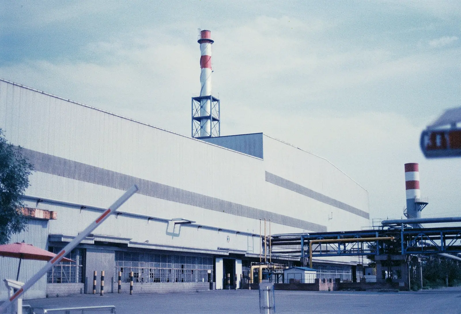 Industrial facility with chimney stacks